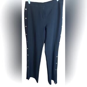 Chico’s Black Knit Pants With Square Gold Snaps on the sides. Size 0